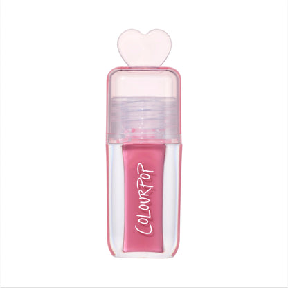 ColourPop Your New Obsession ultra glossy lip in the Heart to Get shade standing upright on a white background, featuring a clear pink tube with bold white logo and a translucent heart-shaped cap for a cute, high-shine lip gloss look.