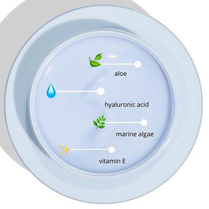 Soak It Up Hydrating Mask, a ColourPop Face Mask, displayed in an open jar of pale lavender gel, highlights ingredients with callouts - aloe, hyaluronic acid, marine algae, and vitamin E - on a white dish under bright light.